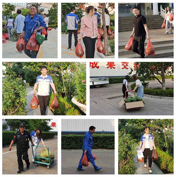 各部門派來領西瓜的代表，各個喜笑顏開.jpg